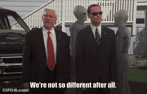 Two Men In Suits We're Not So Different After All GIF