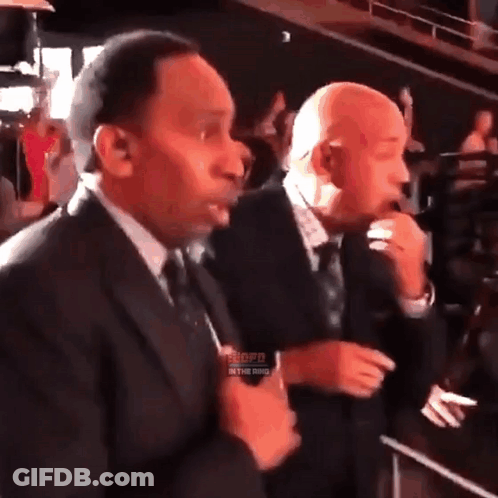 Two Men In Suits With Word Shopd GIF