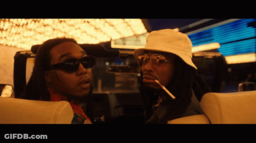 Two Men In Sunglasses And Hats Sitting In Car GIF