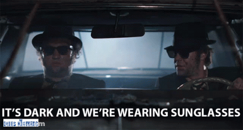 Two Men In Sunglasses Driving Car Saying It's Dark And We're Wearing Sunglasses GIF
