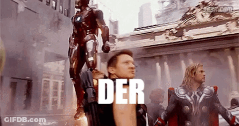Two Men In Superhero Costumes GIF