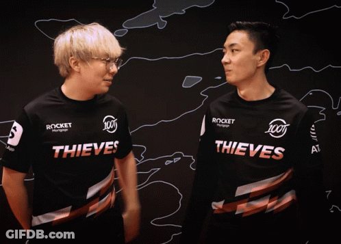 Two Men In Thieves Shirts Standing Together GIF