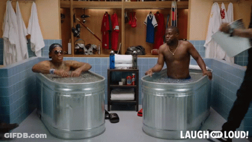 Two Men In Tubs Laugh Out Loud GIF