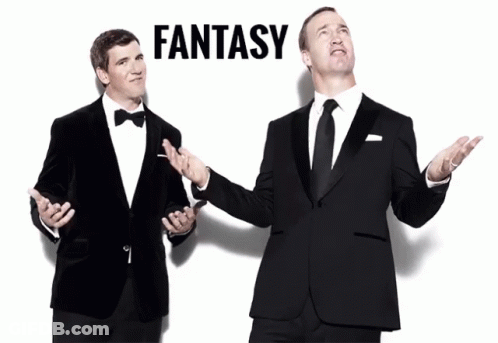 Two Men In Tuxedos Are Standing Next To Each Other And The Word Fantasy Is Above Them GIF