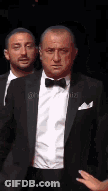 Two Men In Tuxedos GIF