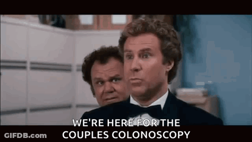 Two Men In Tuxedos Talking About Colonoscopy GIF