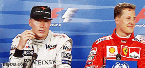 Two Men In West And Marlboro Vests GIF