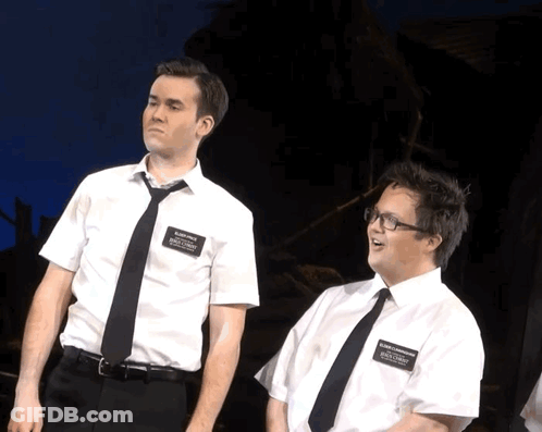 Two Men In White Shirts And Black Ties With Billy Smith Name Tag GIF