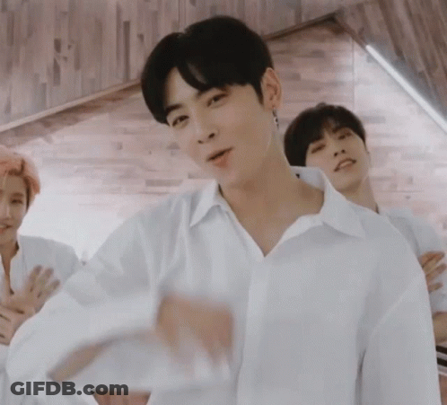 Two Men In White Shirts Standing Together GIF