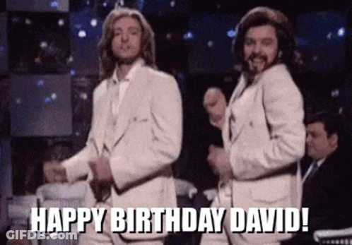 Two Men In White Suits Are Dancing With The Words Happy Birthday David Written On The Bottom GIF