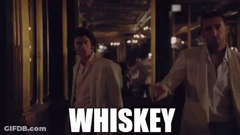 Two Men In White Suits Walking Down Whiskey Hallway GIF