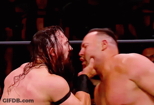 Two Men In Wrestling Ring One With Beard GIF