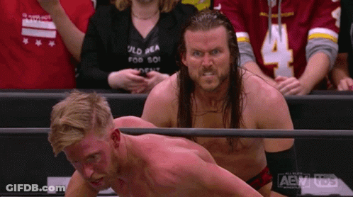 Two Men In Wrestling Ring With AEW Logo GIF