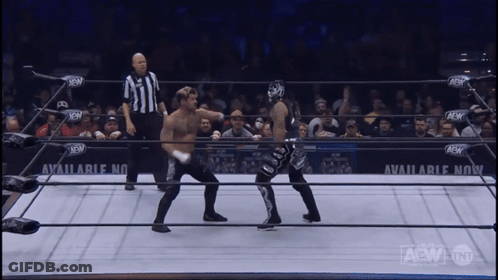 Two Men In Wrestling Ring With Available Now Sign GIF