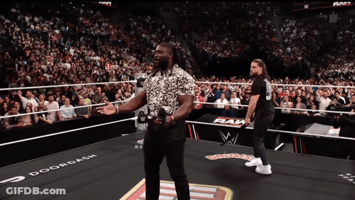 Two Men In Wrestling Ring With Doordash GIF