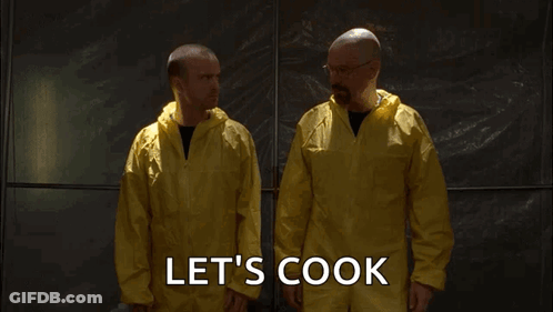 Two Men In Yellow Coveralls Are Standing Next To Each Other With The Words Let 'S Cook Written On The Bottom GIF