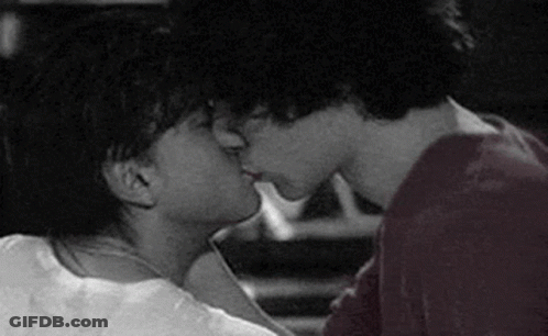 Two Men Kissing Black And White Photo GIF