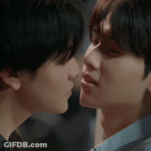 Two Men Kissing Close Up GIF