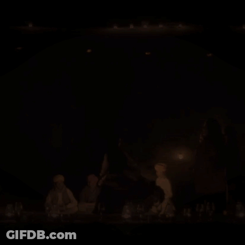Two Men Kissing In Front Of Staircase With NBC GIF