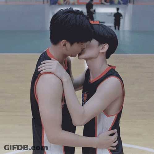 Two Men Kissing On Basketball Court GIF