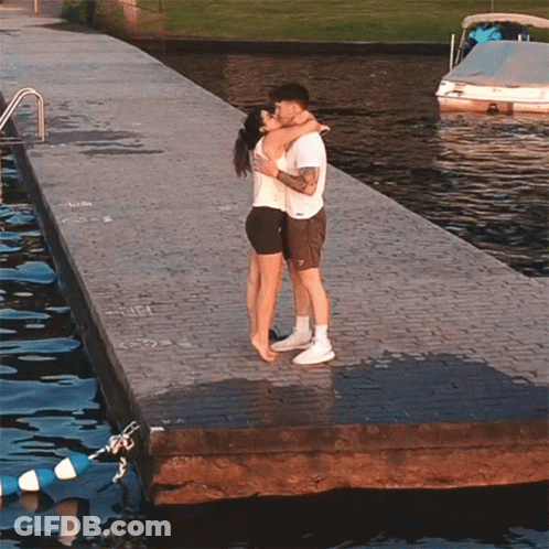 Two Men Kissing On Cheek GIF