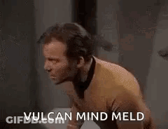 Two Men Kissing One Covering Face GIF
