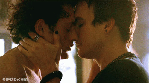Two Men Kissing One Wearing Ring GIF