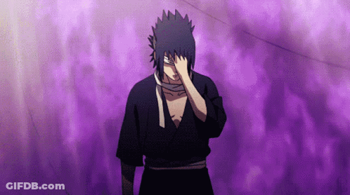 Two Men Kneeling On Beach With Shri In Sand GIF