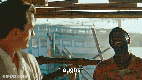 Two Men Laughing In Front Of Boat GIF
