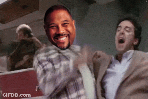 Two Men Laughing In Suit And Plaid Shirt GIF