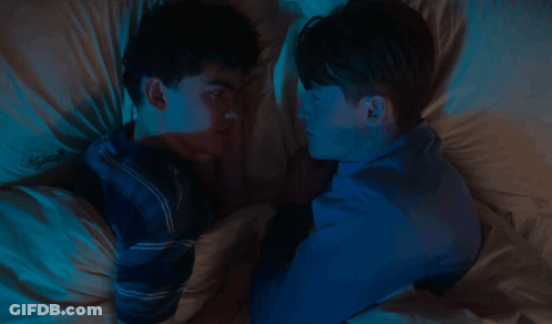 Two Men Laying In Bed With The Words I Wanna Stay Up All Night GIF