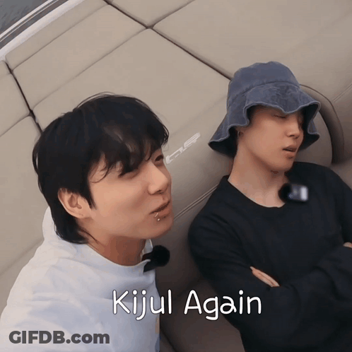 Two Men Laying On A Couch With The Words Kijul Again Written Below Them GIF