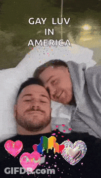 Two Men Laying On Bed Gay Luv In America GIF