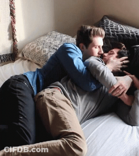 Two Men Laying On Bed One Wearing I Love You Shirt GIF