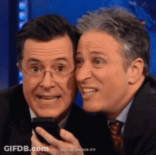 Two Men Looking At Cell Phone GIF