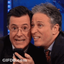Two Men Looking At Cell Phone GIF