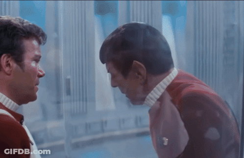 Two Men Looking At Each Other GIF
