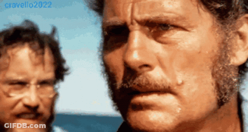 Two Men Looking At Each Other 2022 GIF