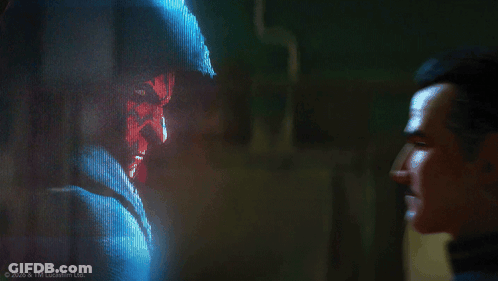 Two Men Looking At Each Other GIF
