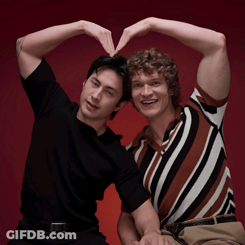 Two Men Looking At Each Other GIF