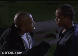 Two Men Looking At Each Other GIF