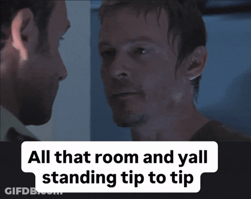 Two Men Looking At Each Other Saying All That Room And Yall Standing Tip To Tip GIF