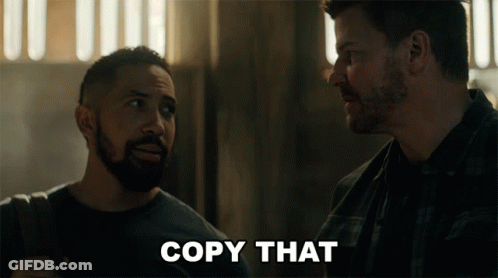 Two Men Looking At Each Other Saying Copy That GIF