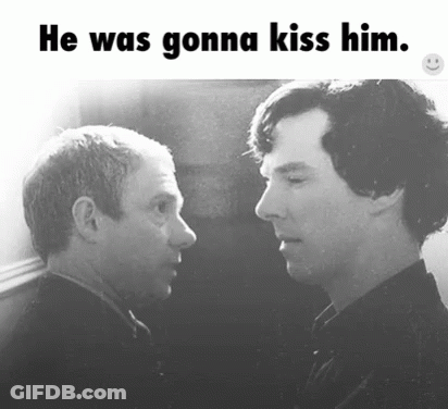 Two Men Looking At Each Other Saying He Was Gonna Kiss Him GIF