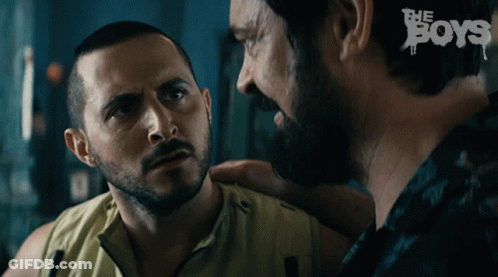 Two Men Looking At Each Other Saying The Boys GIF