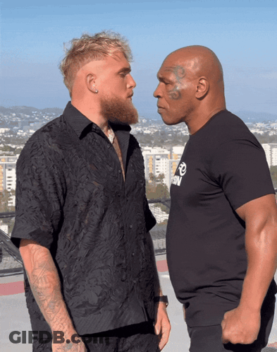Two Men Looking At Each Other GIF