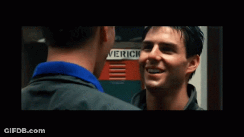 Two Men Looking At Ice Sign GIF