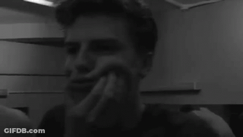 Two Men Making Funny Faces Black And White GIF