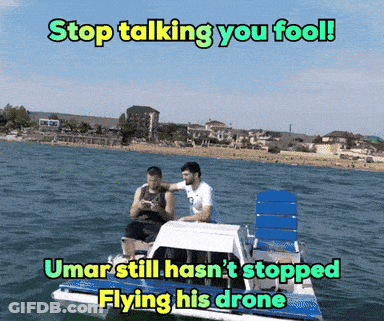 Two Men On Boat Saying Stop Talking You Fool Umar Still Hasn't Stopped Flying His Drone GIF