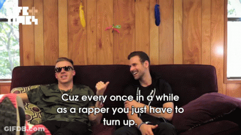 Two Men On Couch Saying Cuz Every Once In D While As A Rapper GIF